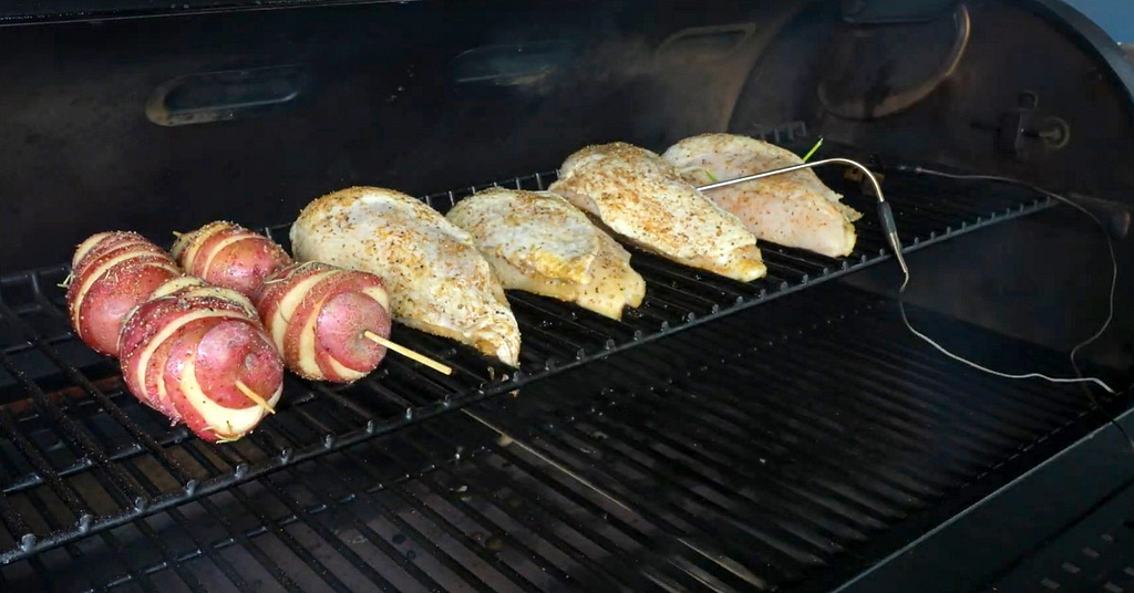 Place the potatoes into the smoker