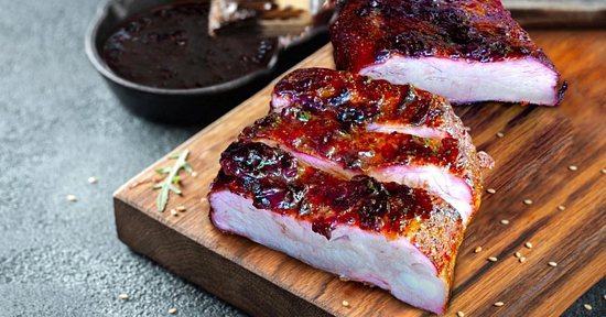 smoked pork ribs recipe with blueberry bourbon sauce