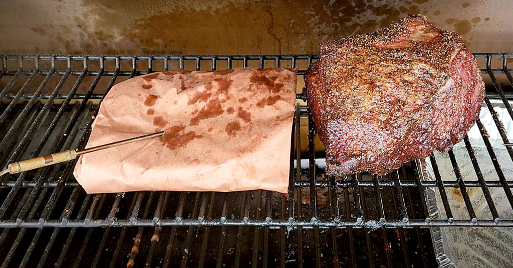 Insert a grill thermometer into the roast