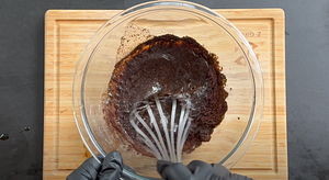 Mixing the coffee marinade ingredients in a bowl.