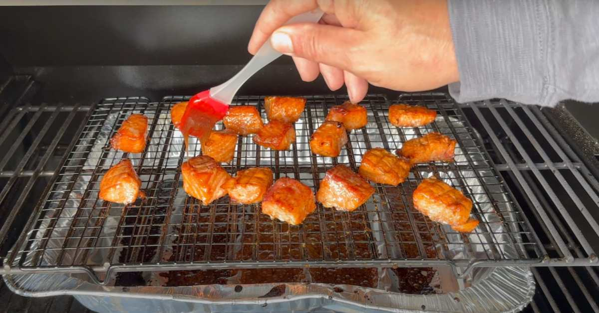 Basting the Salmon with Maple Bourbon Glaze